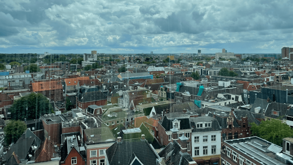 View of dense, historic urban core with 3-4 story buildings.