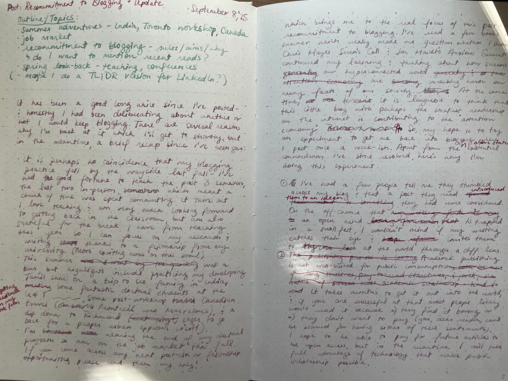 A notebook with cursive writing.